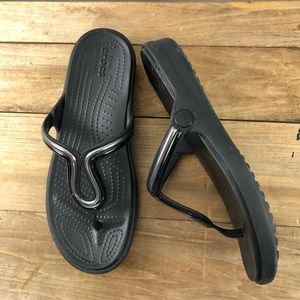 Crocs black/silver flip flops